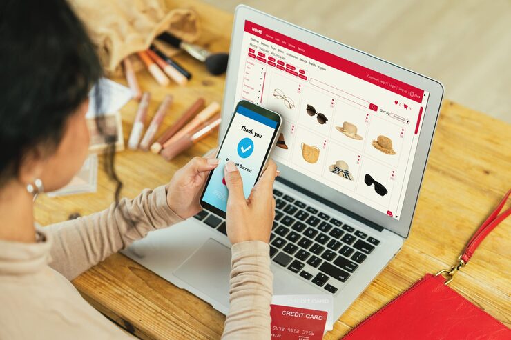 woman shopping online internet marketplace browsing sale items modern lifestyle use credit card online payment from wallet protected by crucial cyber security software 31965 231340